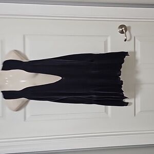 Free People small sleeveless pullover vest top.   Grey knit.